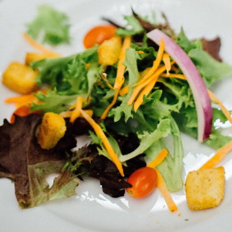 Fresh mixed greens salad with colorful vegetables