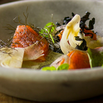 Artistically plated dessert with refined presentation